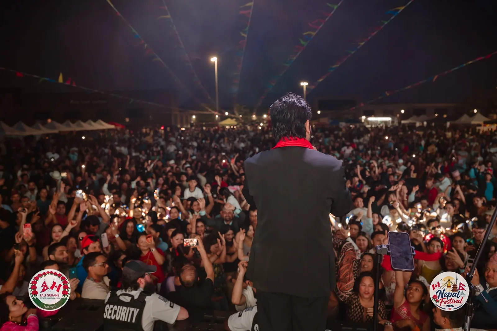 Performer and audience at Nepal Festival in the evening